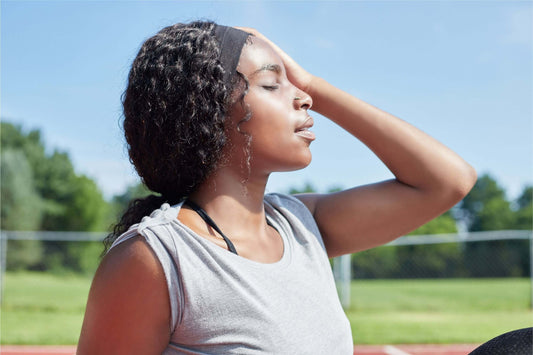 woman in sun wearing exerties